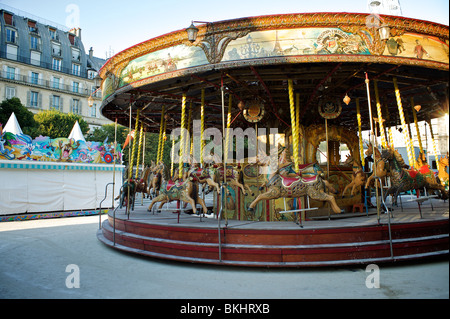 Traditional carousel in Parisian fun fair Stock Photo