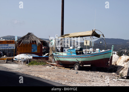 A TRADITIONAL CYPRIOT FISHING BOAT IN THE BOATYARD AT LATCHI ON THE ISLAND OF CYPRUS. Stock Photo