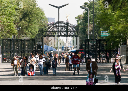 diverse multi ethnic crowd of people entering Chapultepec Park on a sunny Sunday in Mexico City Stock Photo