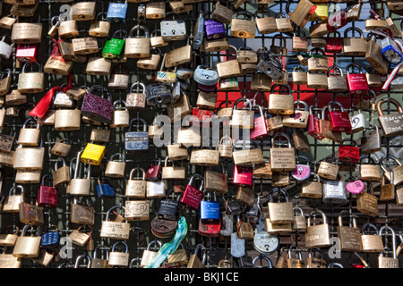 Padlocks as a symbol for friendship and love on Hohenzollernbruecke Bridge, Cologne, Germany, North Rhine-Westphalia, Germany Stock Photo