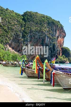 Thai longtail boats on Railay Beach in Krabi, Southern Thailand Stock Photo