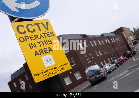 CCTV operates in this area warning sign camera surveillance in urban Taunton Somerset Stock Photo