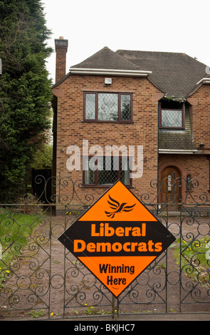 Liberal Democrat Party poster displayed on a private wall outside a house in a suburb of Leicestershire. Stock Photo