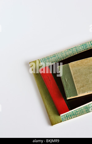 Old vintage retro receipt books on white background Stock Photo