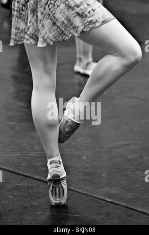Ballet dancer practicing dance moves in studio. Stock Photo