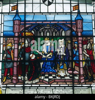 St. Botolph's church Stained glass window depicting William I conferring the patronage of St. Botolph's church Stock Photo