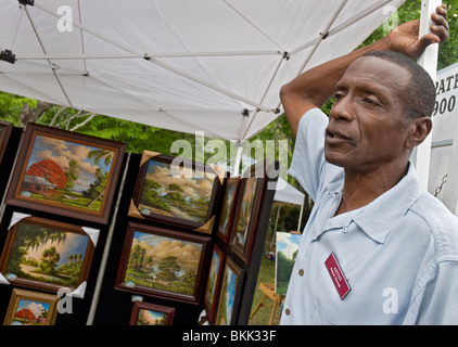 African American artist Jimmy Stovall one of the famous Highwaymen a group of Florida Black artists selling their art from their cars Stock Photo