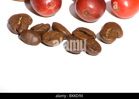 Close-up of fresh coffee cherries and roasted coffee beans Stock Photo