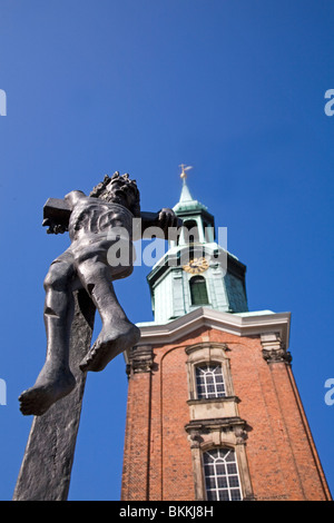 A sculpture shows the crucifixion of Jesus Christ at the Heilige Dreieinigkeitskirche, (St Georgskirche) in Hamburg, Germany. Stock Photo