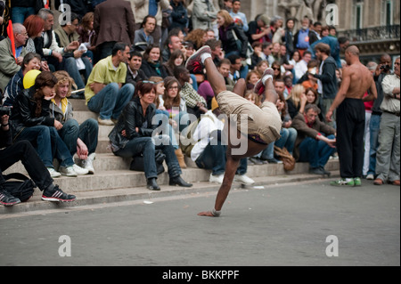 Crowd Watching Break Dancer Street performers, Paris France, audience and performer, black community Paris, hip hop dance, African in French street Stock Photo