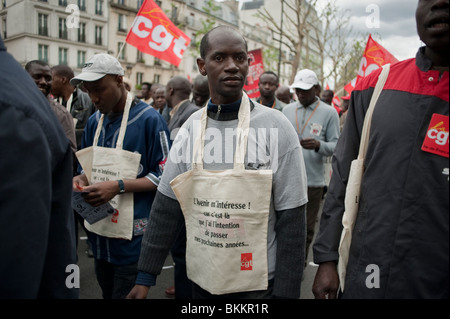 African Migrants, African Immigrants, Demonstrating in labor day may Demonstration, Paris, France, Holding Protest Signs on Street, labour Workers Protests, CGT, black community Paris, immigrants rights, workers rights protests Stock Photo