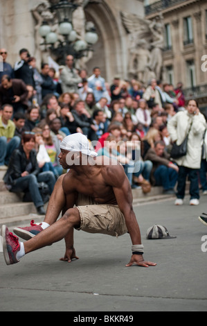 Teens Performing,with Diverse People, Watching Young, Hip Hop, Break Dancer on Street, Paris, France, audience and performer, city colour Stock Photo