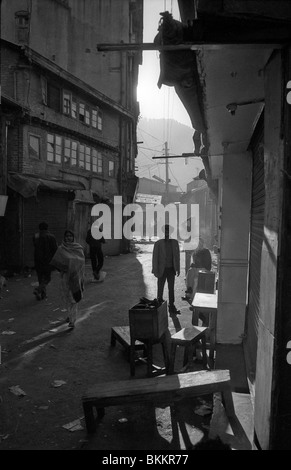 The sunrise beginning to warm the maze of narrow streets of the Sabzi Mandi or Lower Bazar in Shimla Stock Photo