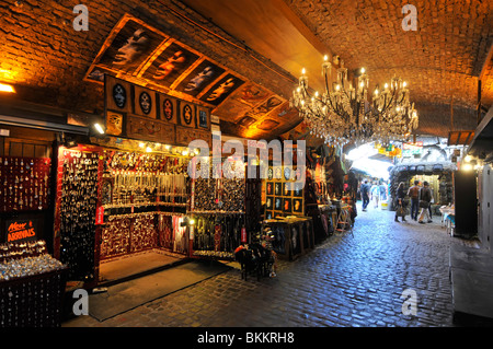 Stables Market stalls & chandelier light in former historical Pickfords stables buildings part of Camden Market in Camden Town London England UK Stock Photo