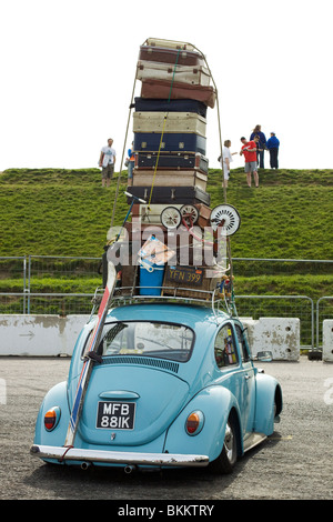 Volkswagen Beetle overloaded with suitcases Stock Photo