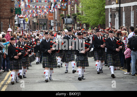 Warrington Pipe band playing during the Mayday celebrations Knutsford Stock Photo