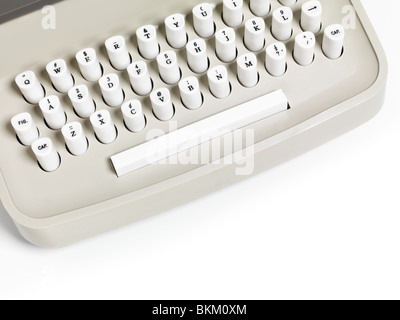 Closeup of a retro typewriter keyboard isolated on white background Stock Photo