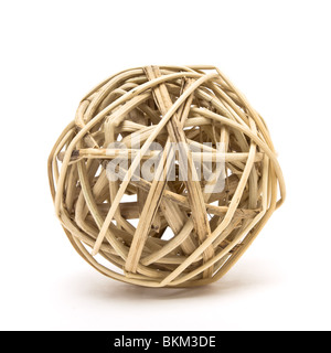 Woven wickerwork ball made from bamboo, reed or willow isolated against white background. Stock Photo