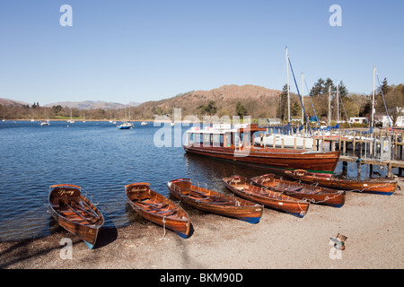 Rowing boats for hire on Lake Windermere lakeside in the Lake District National Park. Waterhead, Ambleside, Cumbria, England, UK Stock Photo