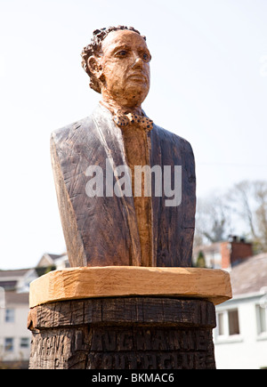 Carved wooden bust of Dylan Thomas in his home town of Laugharne Wales UK Stock Photo
