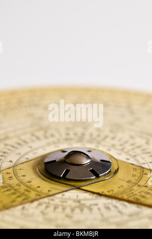 Concentric Binary Measuring Slide Ruler on white background. Stock Photo