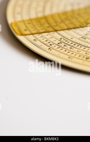 Concentric Binary Measuring Slide Ruler on white background. Stock Photo