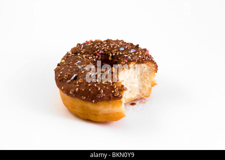 chocolate covered doughnut with a bite taken out over white Stock Photo