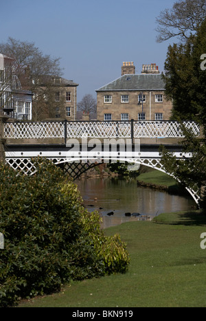 iron bridge in the pavilion gardens Buxton Derbyshire England UK Stock Photo