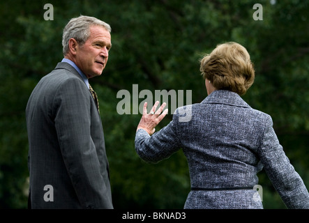 President George Bush and First Lady Laura Bush depart the South Lawn of the White House aboard Marine One Stock Photo