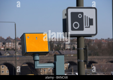 yellow speed traffic camera and warning sign on a road in Buxton Derbyshire England UK Stock Photo