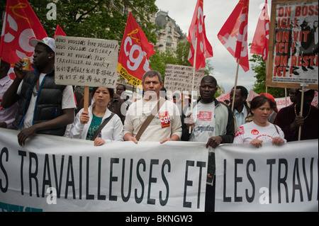 France's Illegal Immigrants,  Migrant Workers Protests, Holding Protest SIngs, Demonstrating in May 1, Labor, May Day Demonstration, Paris, France, Labour Protests, CGT protest support immigration rights, france migrant protests Stock Photo