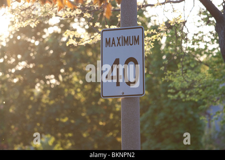 sign traffic road street signs speed limit sunset 40 Stock Photo