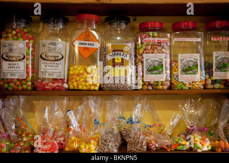Old Fashioned Sweet Shop, Boiled sweets & Jars with packets of confectionery, Arbroath, Scotland, UK Stock Photo