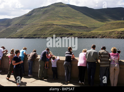 Lesotho: South African Tourists on top of the wall of Katse Dam in the Highlands of Lesotho Stock Photo