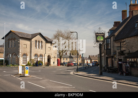 View up the High Street from Cheapside in the Cotswold village of Bampton, Oxfordshire, Uk Stock Photo