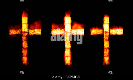 great image of a three christian cross on fire Stock Photo