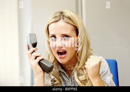 Young Business Woman Using Telephone. Model Released Stock Photo