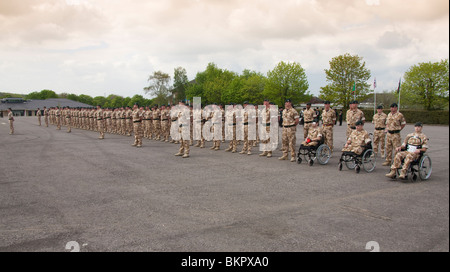 The British Armies 4th Battalion The Rifles on parade at Bulford Camp's Kiwi Barracks parade ground in desert kit Stock Photo