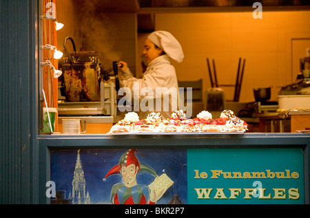Belgium, Brussels; An outlet selling traditional sweet waffles, A wafer served warm with a sweet filling Stock Photo