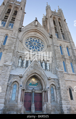 The front of the Church of our Lady, looking up, in Guelph, Ontario, Canada Stock Photo