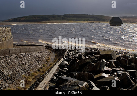 Kielder Water reservoir and dam from Yarrowmoor with valve tower in stormy weather, UK Stock Photo