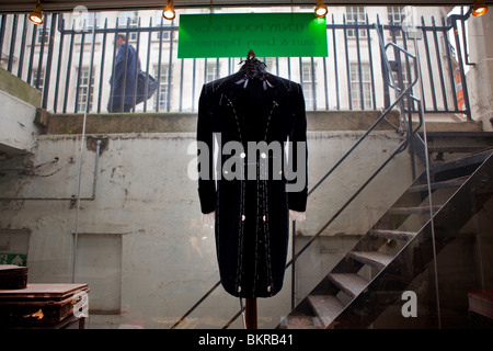 A suit on display in the window of Stowers Bespoke, in Savile Row London. Stock Photo