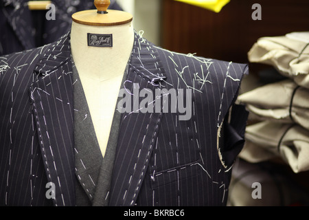 A tailored suit in progress in the studio of Henry Poole in Savile Row London. Stock Photo