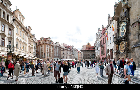 PRAGUE, Czech Republic - Panorama of tourists in front of the Astronomical Clock in Prague's Old Town Square Stock Photo