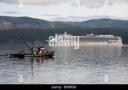 Fishing boat and cruise ship in Johnstone Strait Stock Photo