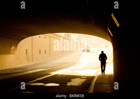 Silhouetted man in a road tunnel in Brussels, Belgium Stock Photo