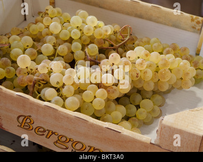 White grapes in wood box for sale. Stock Photo