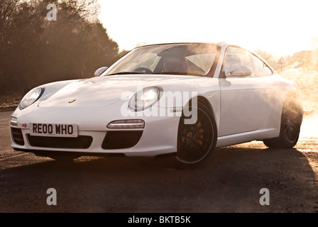 Porsche 911 Carerra S being driven on public road Stock Photo