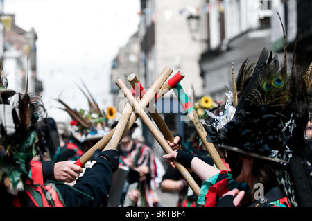 Foxs Border Morris performing a stick dance at the Sweeps Festival Stock Photo