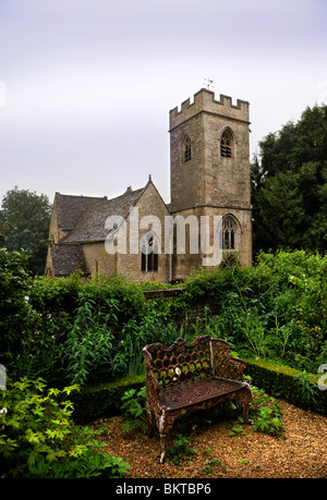 St Nicholas church in Asthall from the Manor gardens near Burford Oxfordshire May 2008 Stock Photo